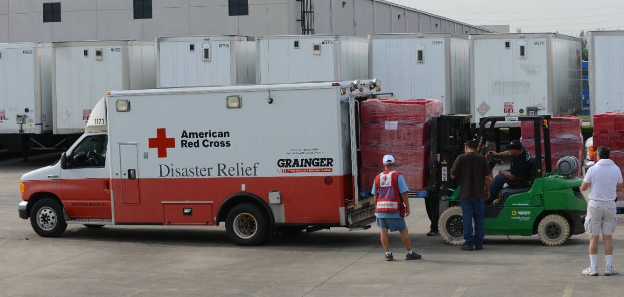 September 3, 2017. Red Cross Distribution Warehouse. Houston, Texas. Volunteers load supplies from a Red Cross distribution warehouse onto Emergency Response Vehicles (ERVs). Photo by Daniel Cima for the American Red Cross